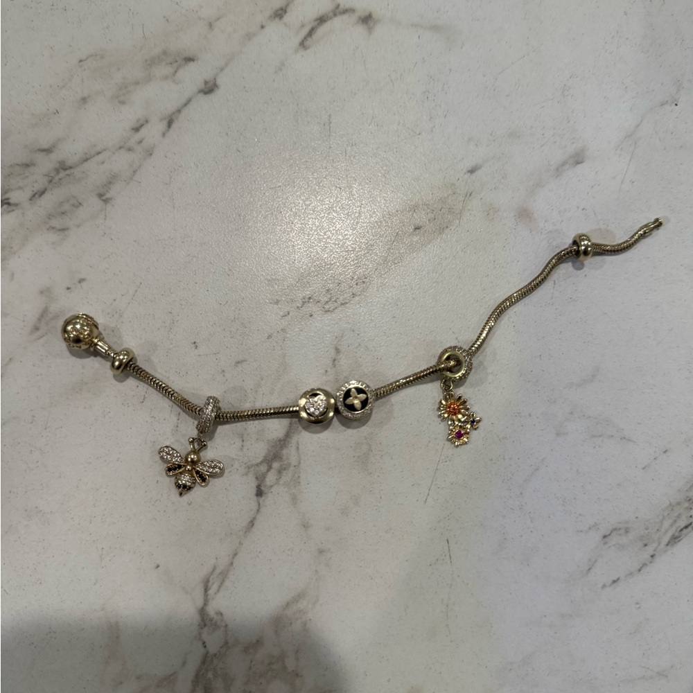 Pandora solid 14k bracelet with charms